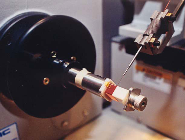 Winding on computer controlled machine.