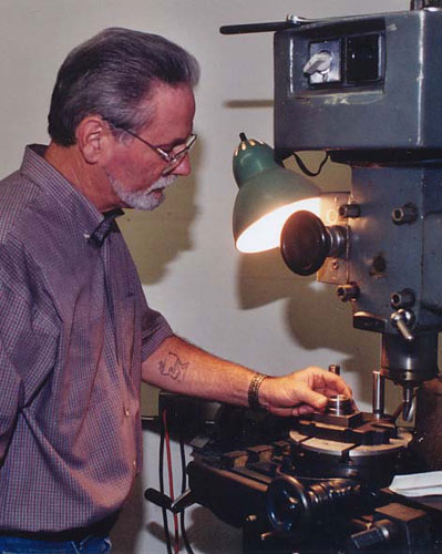 Tom Reichenbach setting up a piece on the mill.